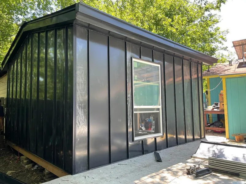 Black standing seam metal wall panels for Roof Inspection in Greene