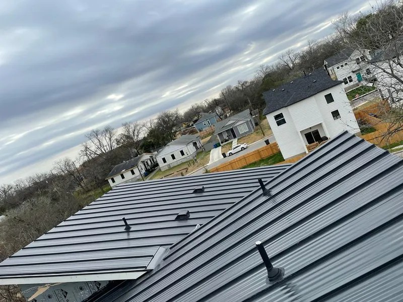 Standing seam metal roof panels with vents for Skylight Repair in Greene
